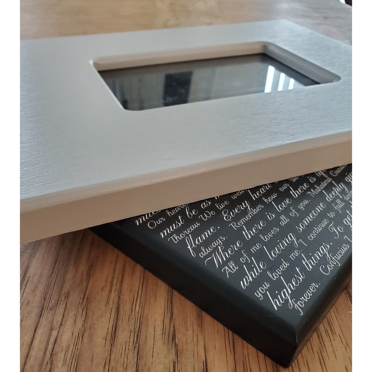 Wood frames, one blank, and one with Storied Affect design.